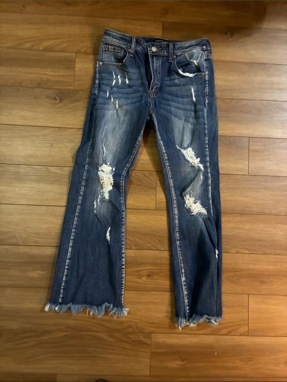 Women's Distressed Dark Blue Denim Jeans with Frayed Hem